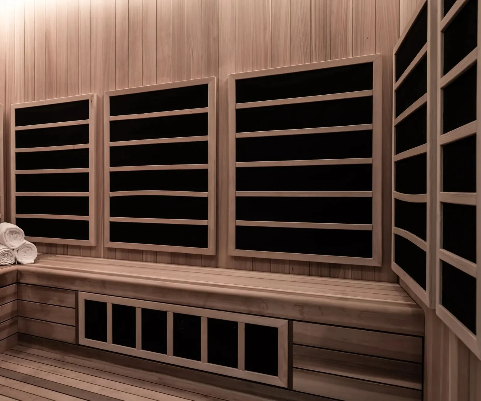 Wood-lined sauna at Equinox Hotel New York with tiered benches